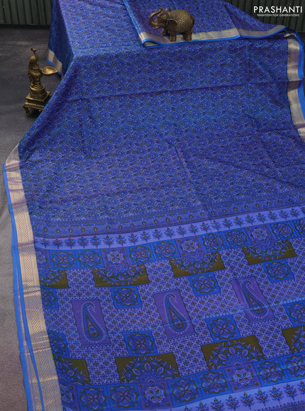Printed silk saree dual shade of bluish purple with allover prints and zari woven border
