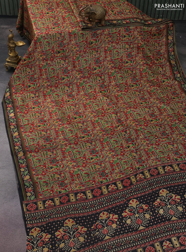 Printed silk saree maroon and black with allover ikat prints and printed border