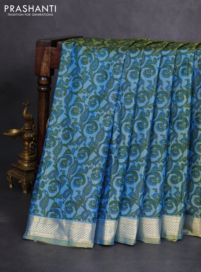 Printed silk saree dual shade of blue with allover prints and zari woven border