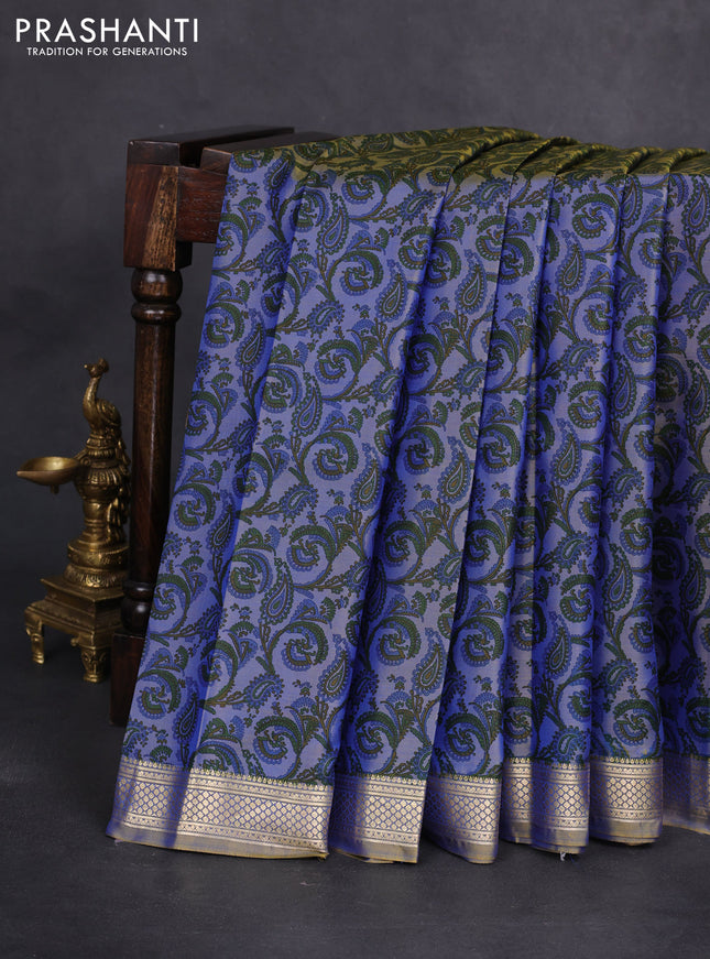 Printed silk saree dual shade of bluish mustard with allover prints and zari woven border