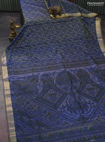 Printed silk saree dual shade of bluish mustard with allover prints and zari woven border
