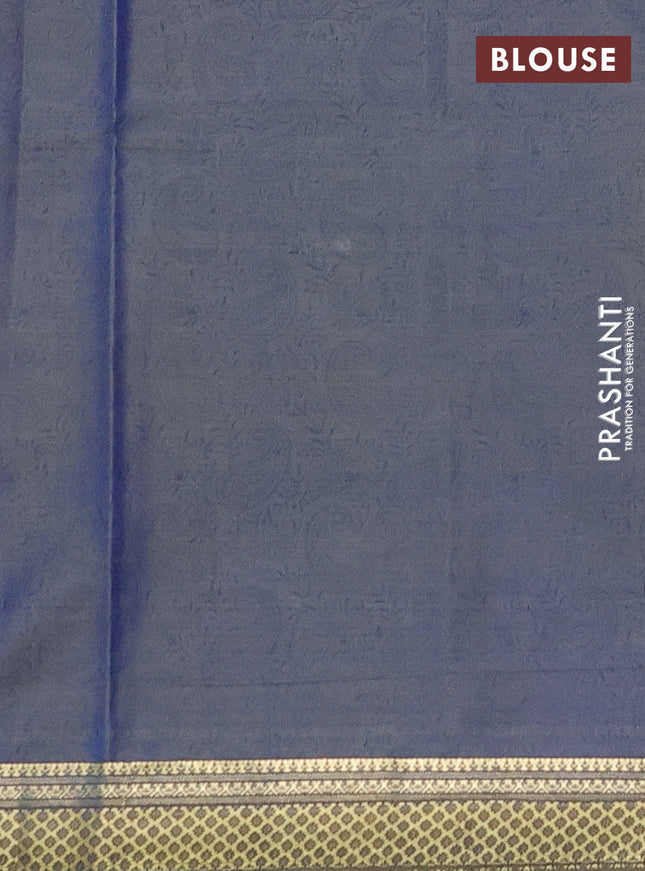 Printed silk saree dual shade of bluish mustard with allover prints and zari woven border