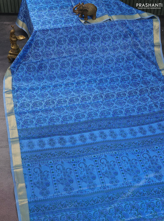 Printed silk saree pastel blue with allover prints and zari woven border