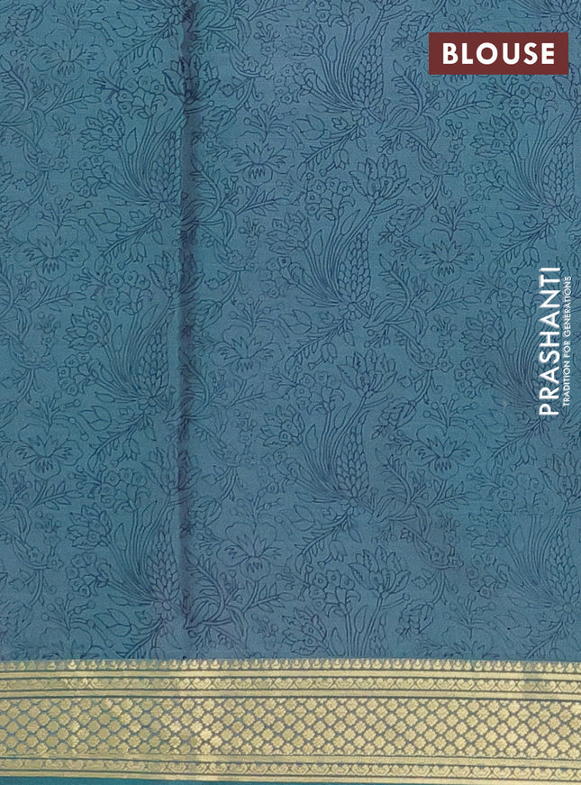 Printed silk saree teal blue with allover prints and zari woven border