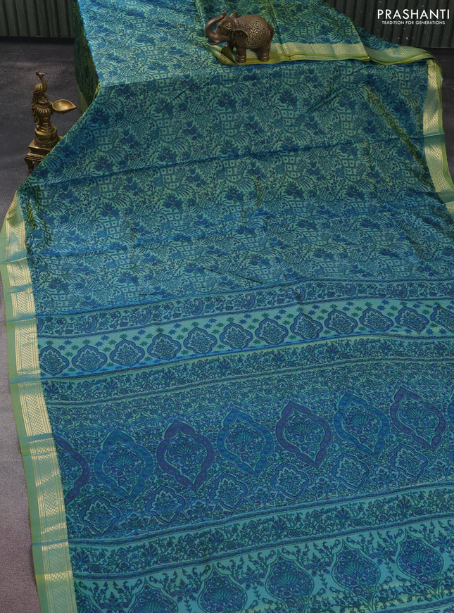 Printed silk saree dual shade of green with allover prints and zari woven border