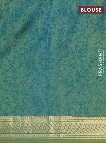 Printed silk saree dual shade of green with allover prints and zari woven border