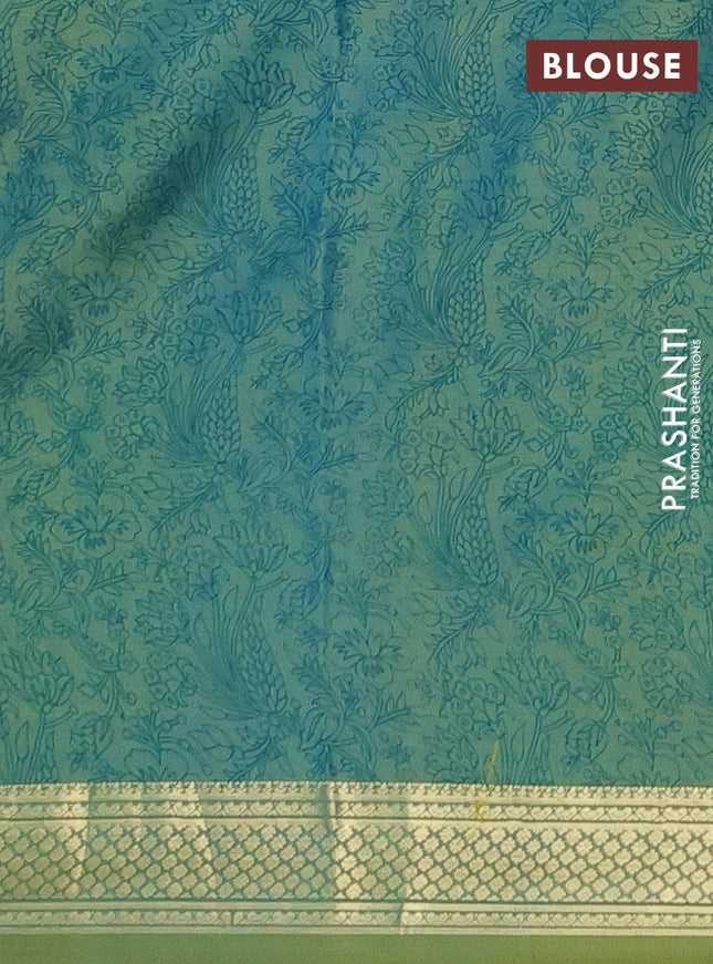 Printed silk saree dual shade of green with allover prints and zari woven border