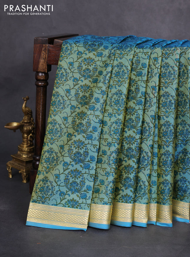 Printed silk saree dual shade of blue with allover prints and zari woven border