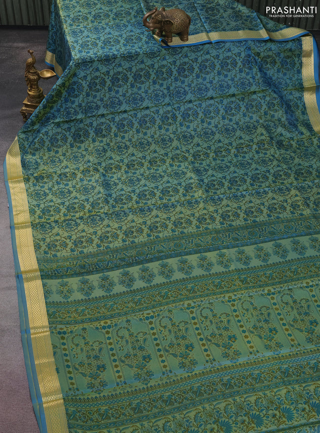 Printed silk saree dual shade of blue with allover prints and zari woven border