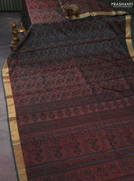 Printed silk saree dual shade of maroonish green with allover prints and zari woven border