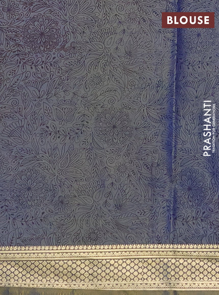 Printed silk saree dual shade of bluish yellow with allover prints and zari woven border