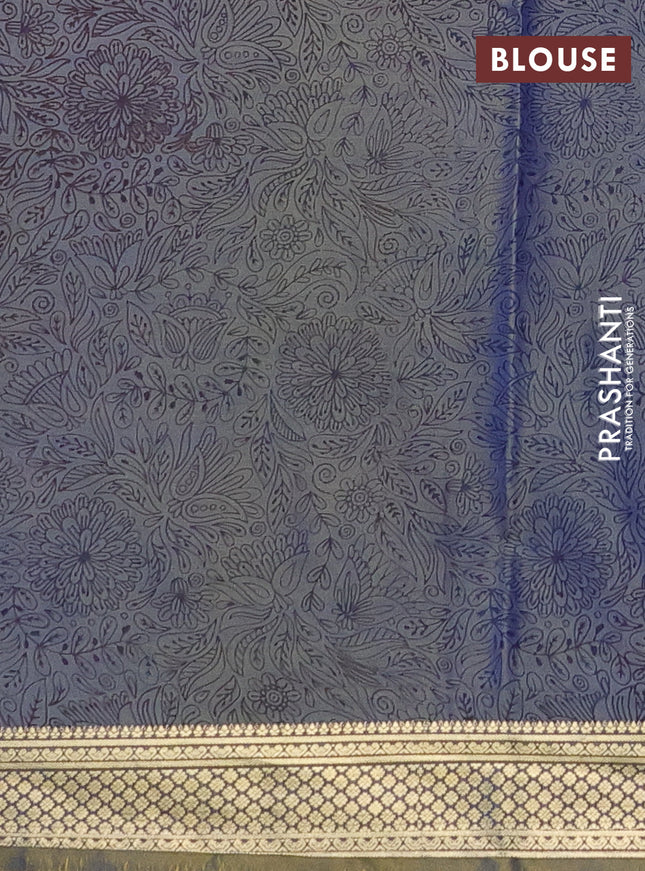 Printed silk saree dual shade of bluish yellow with allover prints and zari woven border