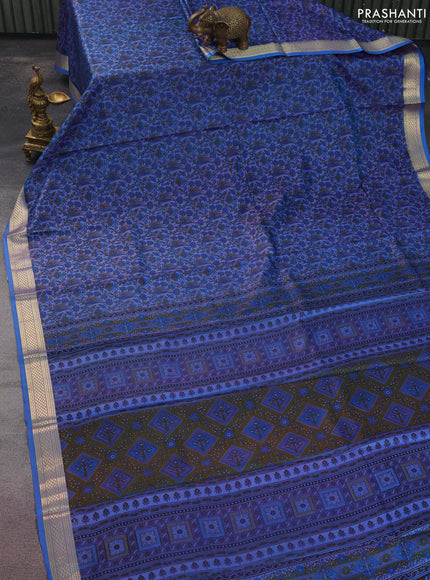 Printed silk saree dual shade of blue with allover prints and zari woven border