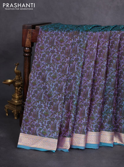 Printed silk saree dual shade of bluish pink and teal green with allover prints and zari woven border