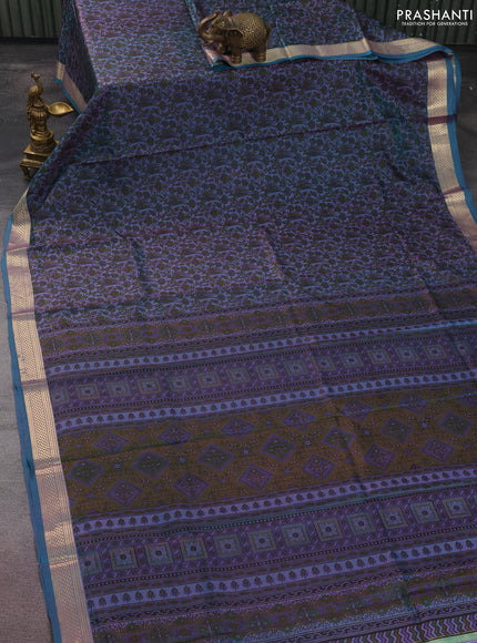 Printed silk saree dual shade of bluish pink and teal green with allover prints and zari woven border