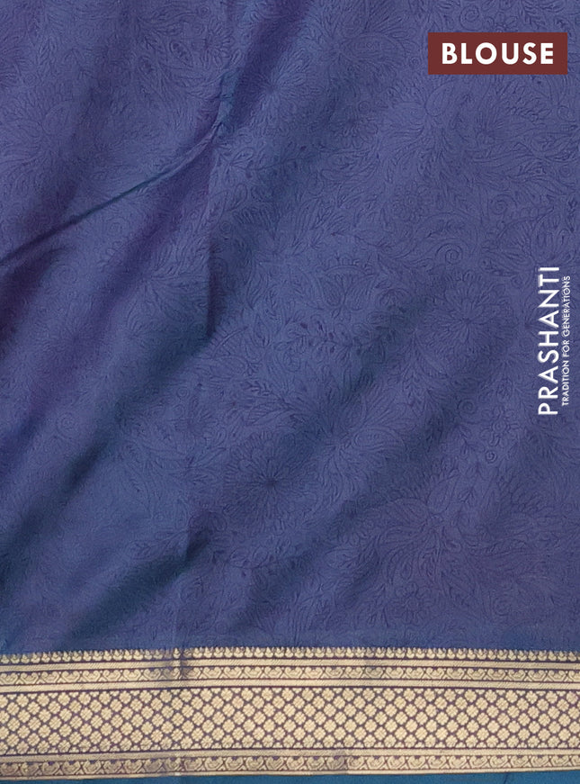 Printed silk saree dual shade of bluish pink and teal green with allover prints and zari woven border