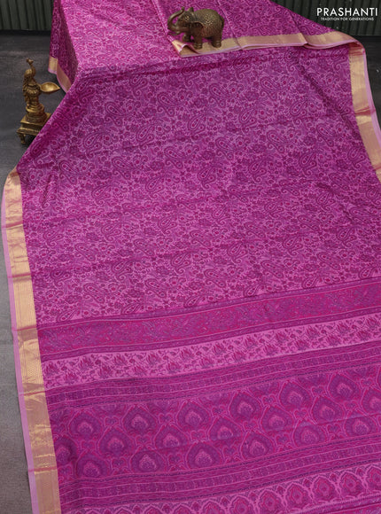 Printed silk saree light pink and pink with allover prints and zari woven border