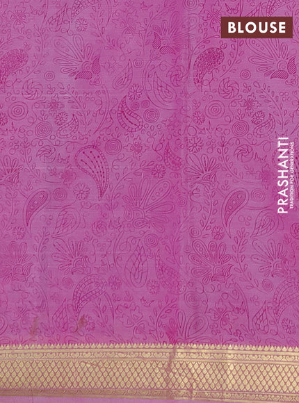 Printed silk saree light pink and pink with allover prints and zari woven border