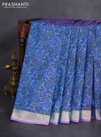 Printed silk saree dual shade of bluish purple with allover prints and zari woven border