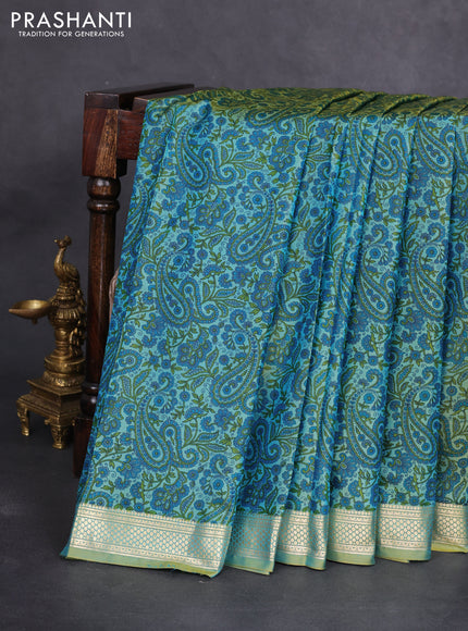 Printed silk saree dual shade of green with allover prints and zari woven border