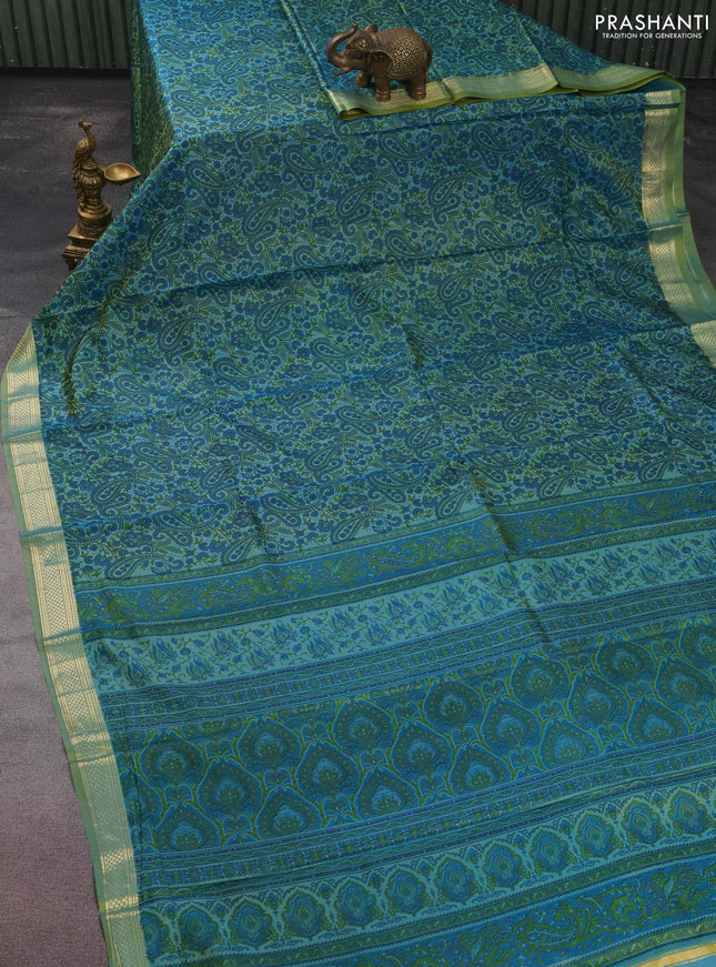 Printed silk saree dual shade of green with allover prints and zari woven border