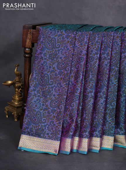 Printed silk saree dual shade of bluish purple with allover prints and zari woven border