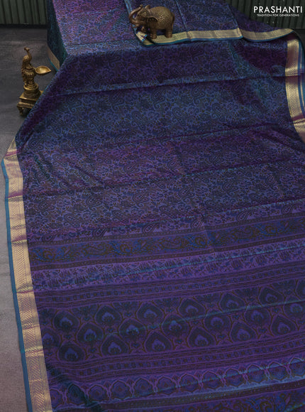 Printed silk saree dual shade of bluish purple with allover prints and zari woven border