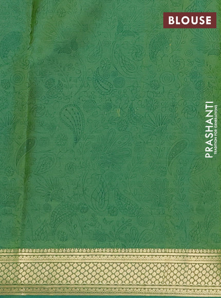 Printed silk saree dual shade of green with allover prints and zari woven border