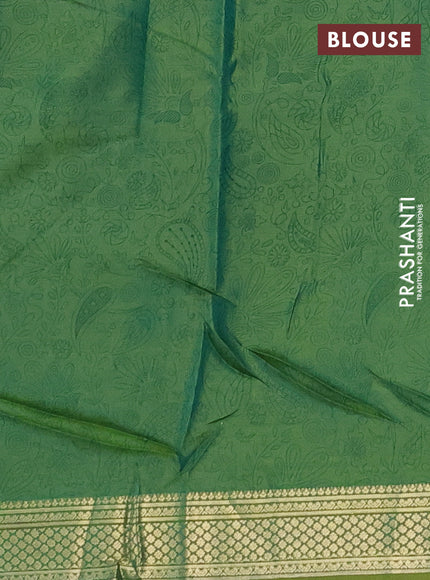 Printed silk saree dual shade of light green with allover prints and zari woven border