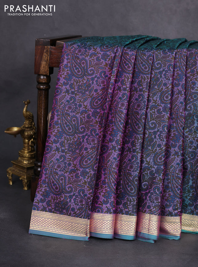 Printed silk saree dual shade of teal greenish purple with allover prints and zari woven border