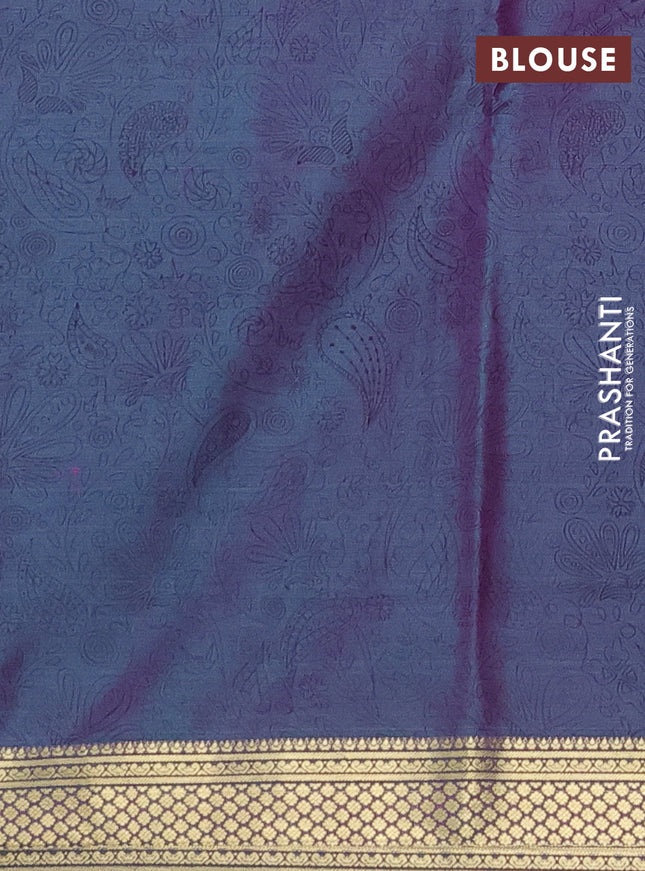 Printed silk saree dual shade of teal greenish purple with allover prints and zari woven border