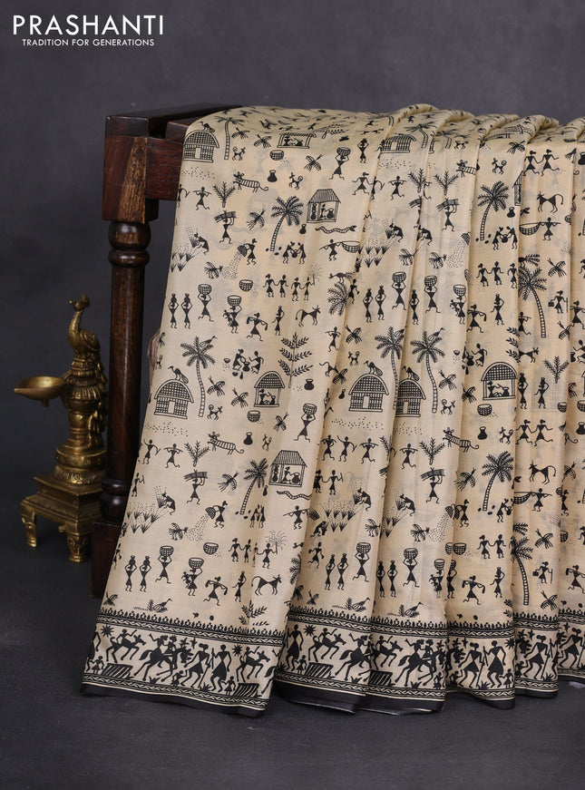 Printed silk saree cream and black with allover warli prints and printed border