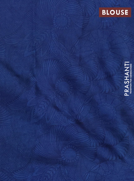 Printed silk saree off white and blue with allover prints and printed border