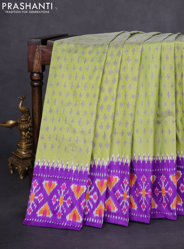 Pochampally silk saree green and violet with allover ikat butta weaves and temple design ikat woven border