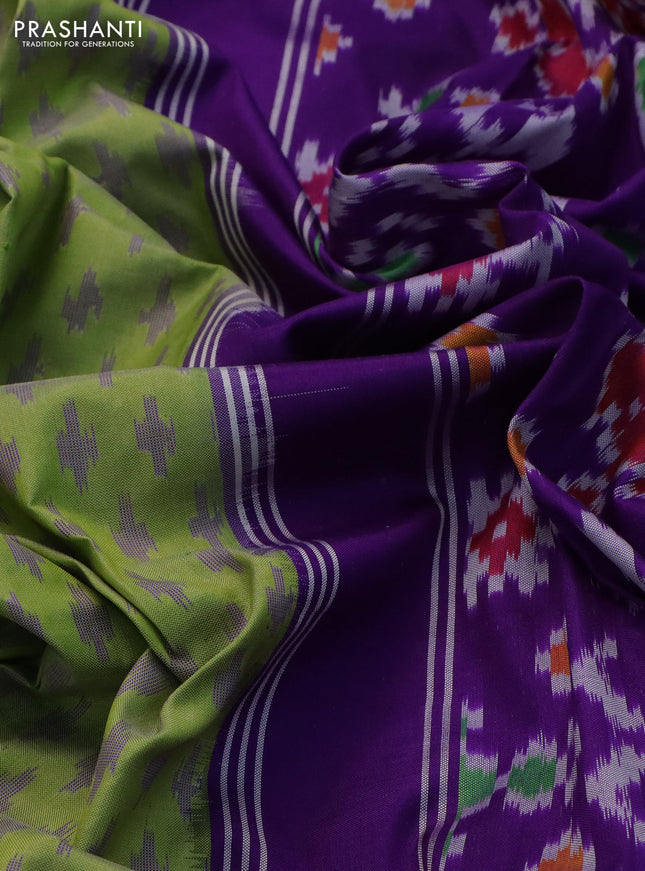 Pochampally silk saree green and violet with allover ikat butta weaves and temple design ikat woven border