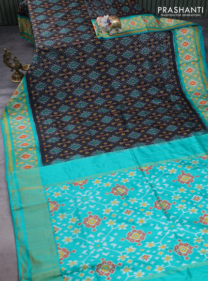 Pochampally silk saree black and teal green with allover ikat weaves and ikat woven zari border