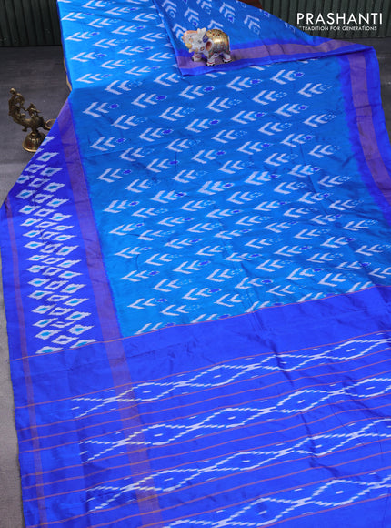 Pochampally silk saree cs blue and blue with allover ikat butta weaves and long zari woven ikat border