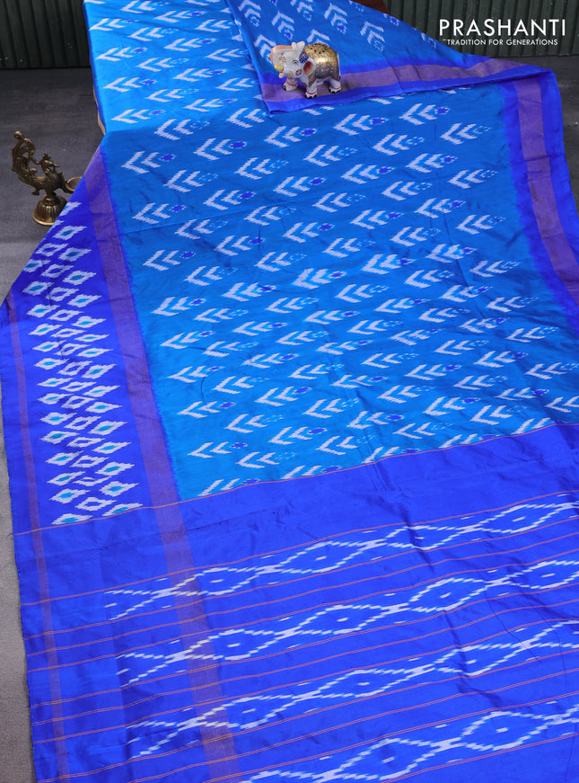 Pochampally silk saree cs blue and blue with allover ikat butta weaves and long zari woven ikat border