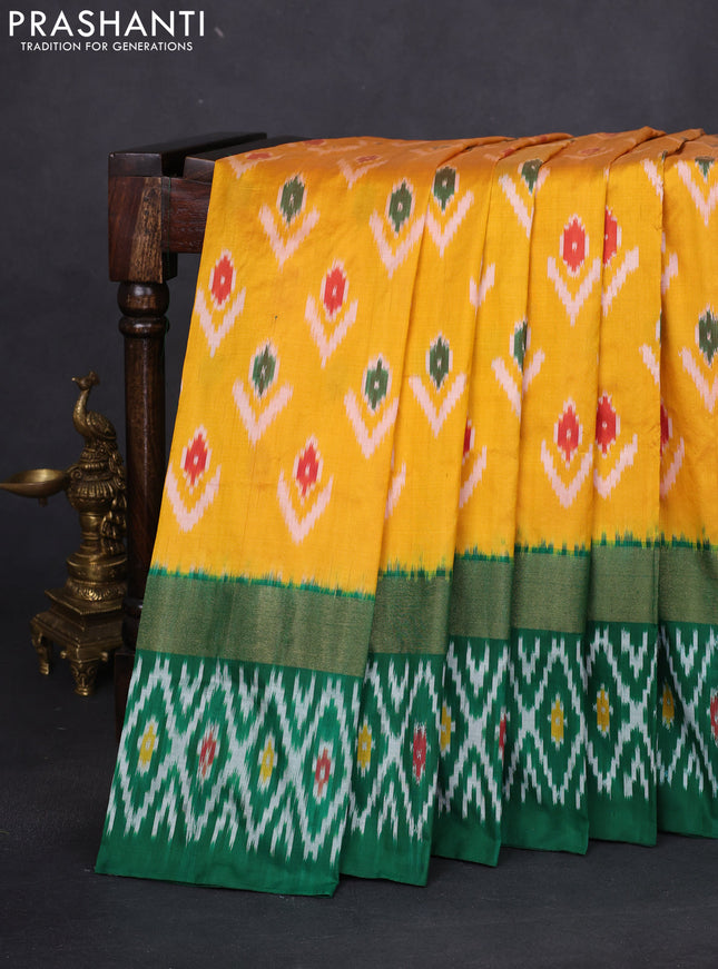 Pochampally silk saree yellow and green with allover ikat butta weaves and long zari woven ikat border