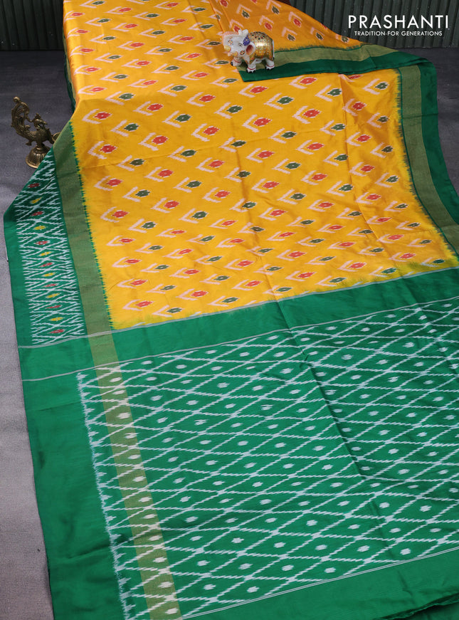 Pochampally silk saree yellow and green with allover ikat butta weaves and long zari woven ikat border