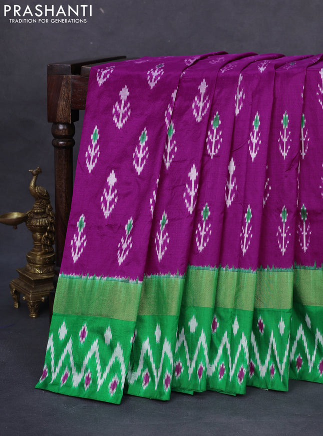 Pochampally silk saree magenta pink and green with allover ikat butta weaves and zari woven ikat border