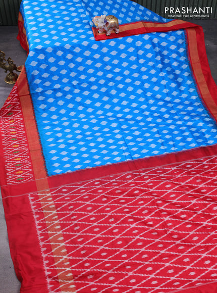 Pochampally silk saree cs blue and red with allover ikat butta weaves and long zari woven ikat border