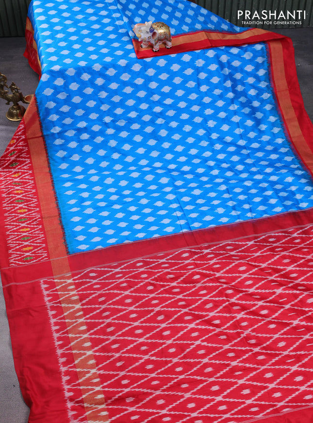 Pochampally silk saree cs blue and red with allover ikat butta weaves and long zari woven ikat border