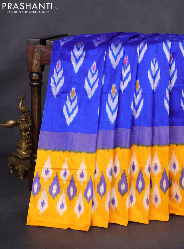 Pochampally silk saree royal blue and mango yellow with allover ikat butta weaves and long zari woven ikat border