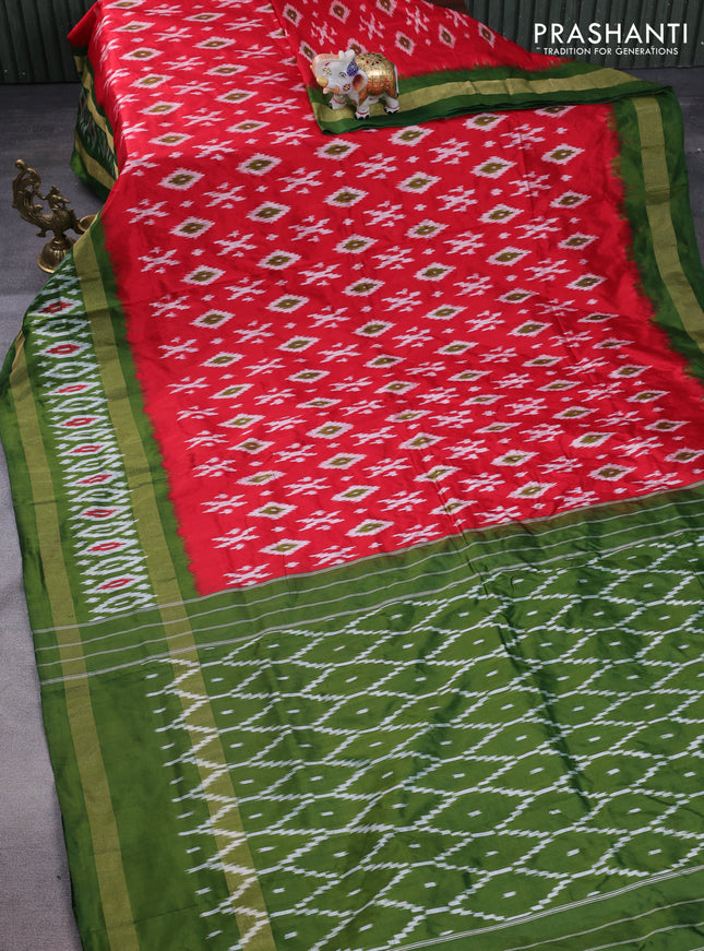 Pochampally silk saree red and sap green with allover ikat butta weaves and long zari woven ikat border