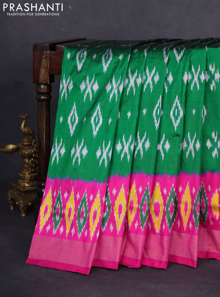 Pochampally silk saree green and pink with allover ikat butta weaves and ikat woven zari border
