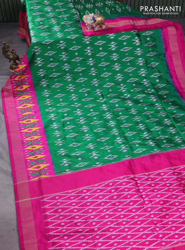 Pochampally silk saree green and pink with allover ikat butta weaves and ikat woven zari border