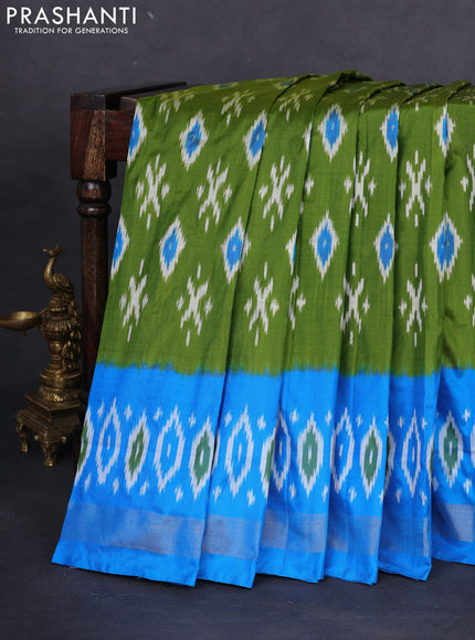 Pochampally silk saree light green and cs blue with allover ikat butta weaves and long ikat woven zari border