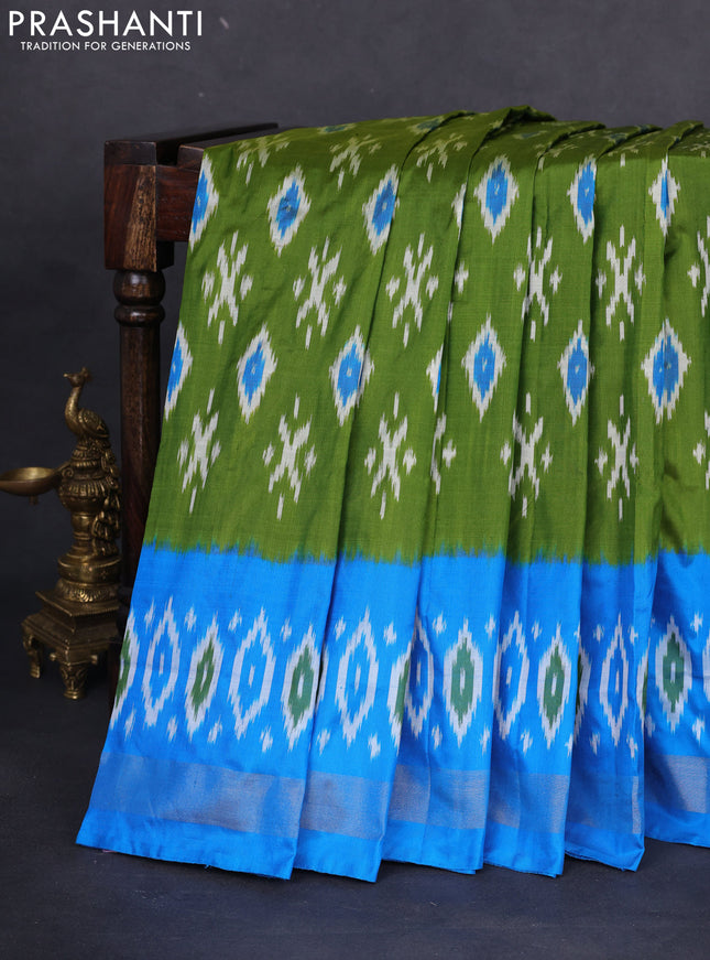 Pochampally silk saree light green and cs blue with allover ikat butta weaves and long ikat woven zari border