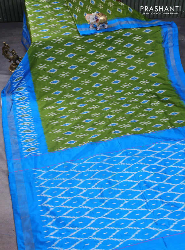 Pochampally silk saree light green and cs blue with allover ikat butta weaves and long ikat woven zari border